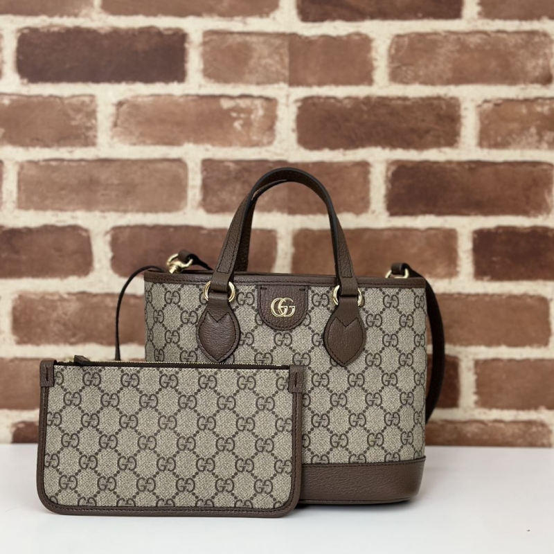 G*u*i shopping bags